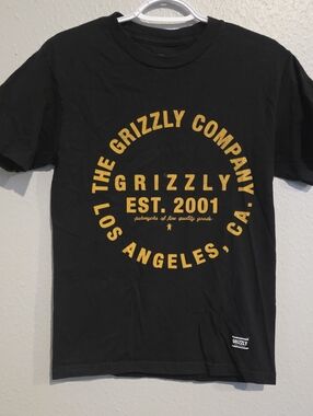 Grizzly Men’s Black Short Sleeve Tee with Gold Logo Print